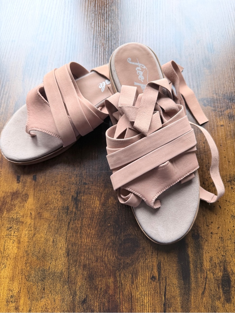 Free People Sun Valley Wrap Sandals in a blush or beige color brand new